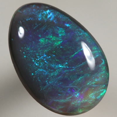 SOLID SEMI BLACK OPAL Bright and rich green and turquoise over blue